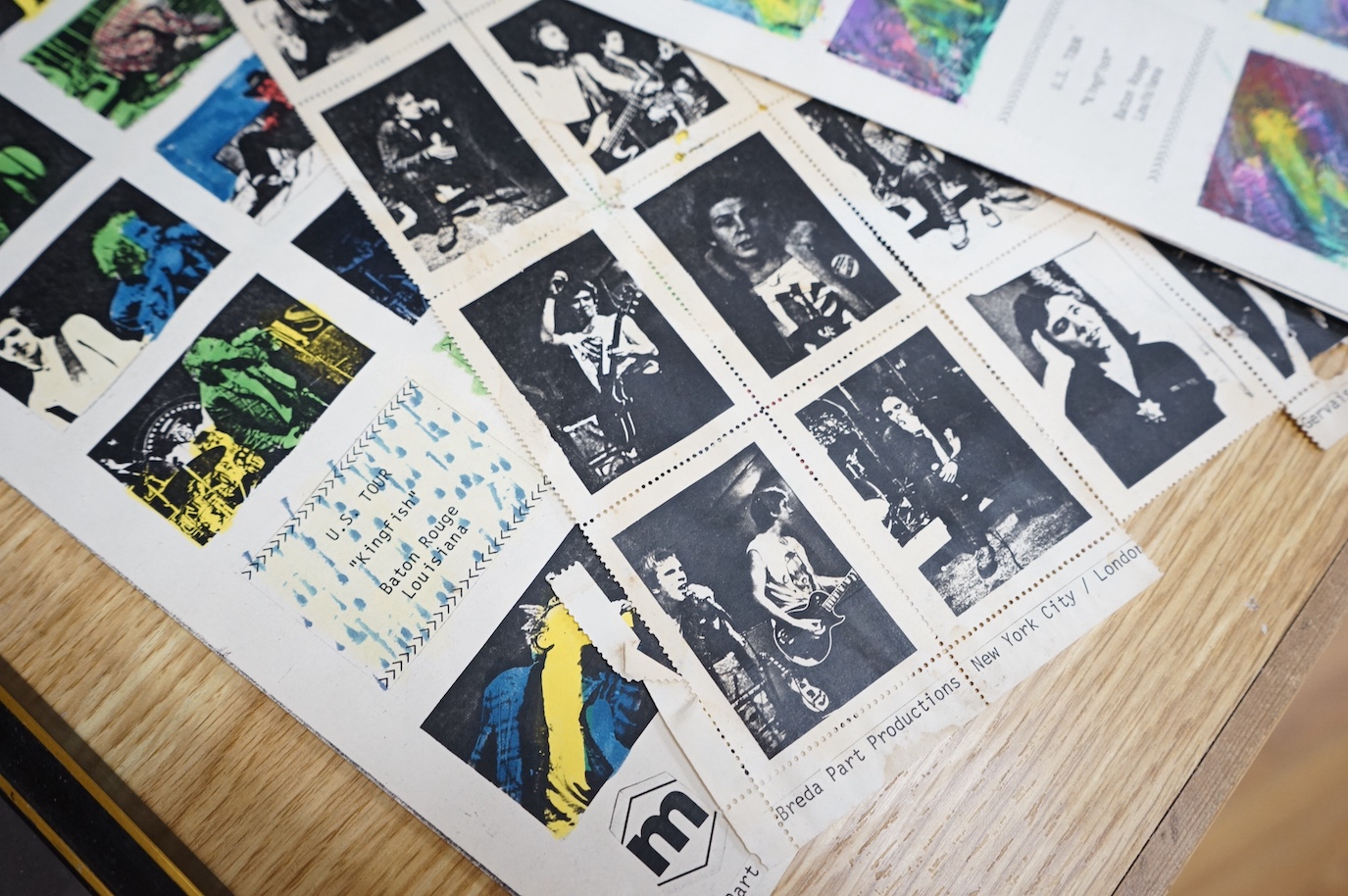 The Sex Pistols interest, eight sheets in the style of a photography contact sheet: 35.5 x 21.5cm, including hand coloured examples by Gracie Mansion, of the Gracie Mansion Gallery, New York, showing the Sex Pistols on t